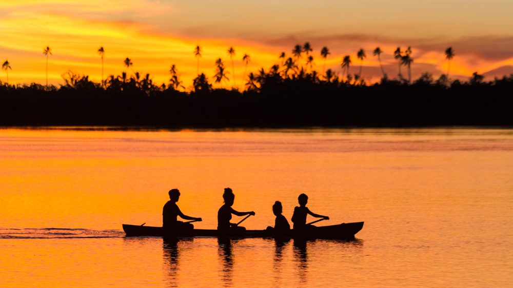 Family Canoeing Silhouette at Sunrise Solomon Islands Malaita